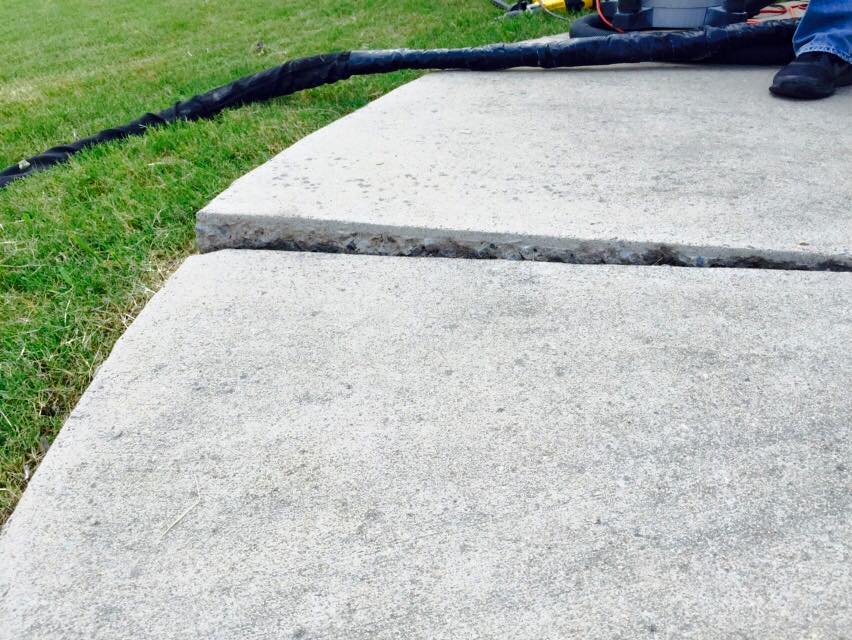 What surfaces need concrete leveling services? Sidewalks like the one pictured here are a good example.
