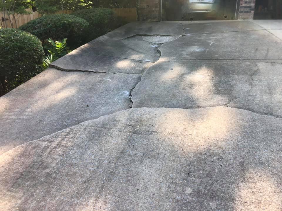 cracked and sunken driveway