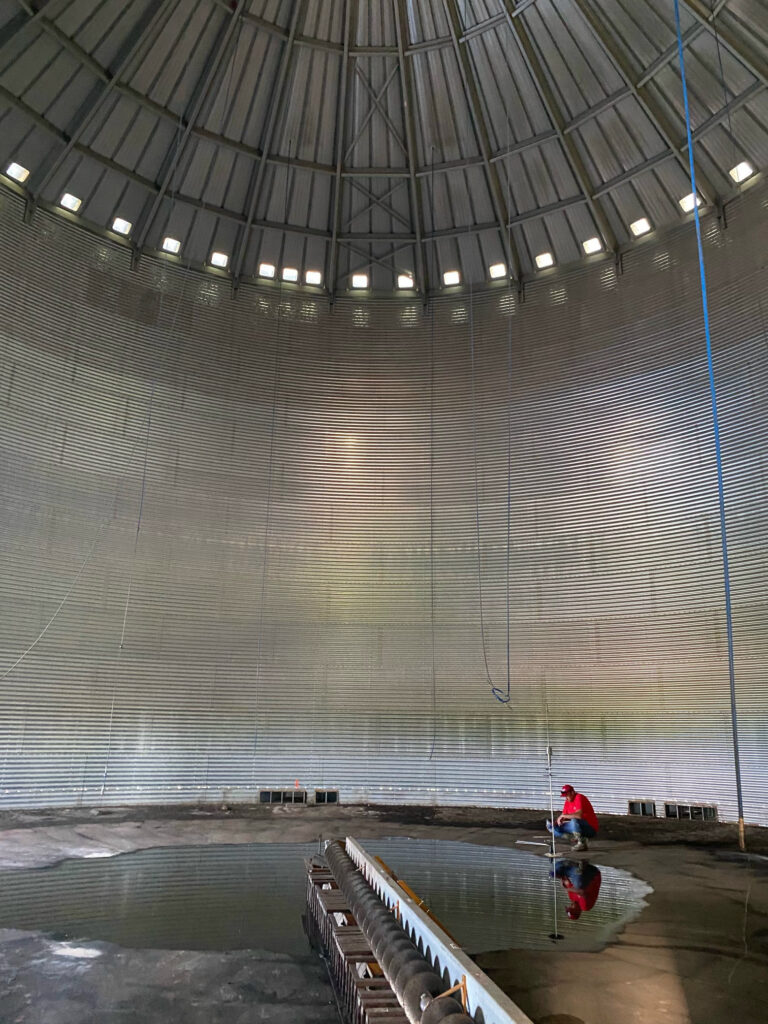 When you have a grain bin sinking, you may experience pooling water as you see in this image.