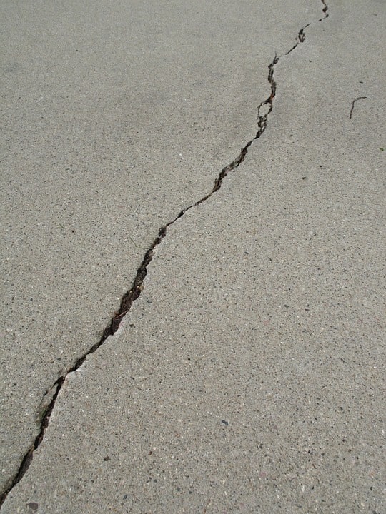 This cracked and settling concrete could use interior concrete slab repair from Airlift. 