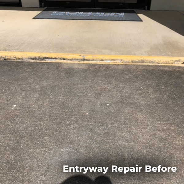 This is an entryway to a business in need of concrete lifting.