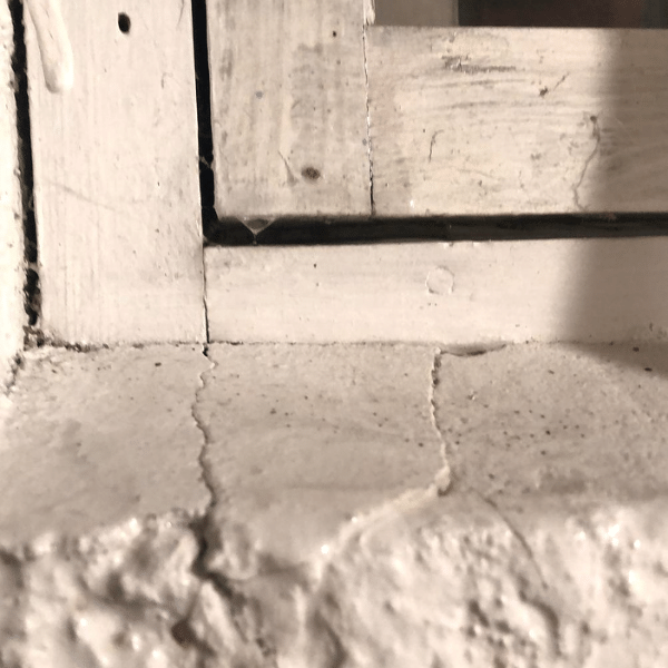 Gap forming around window frame, a common sign of foundation problems