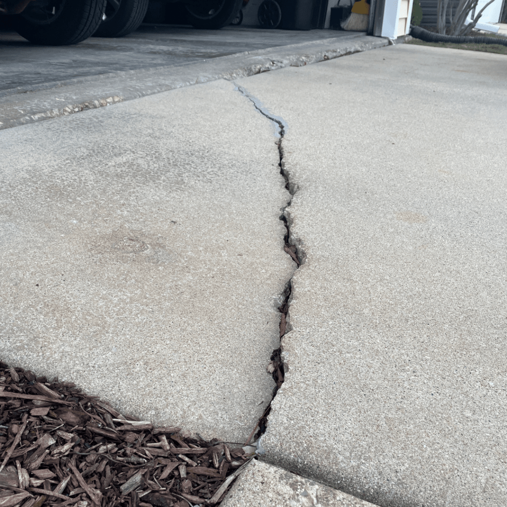Concrete Slab with a large crack in it
