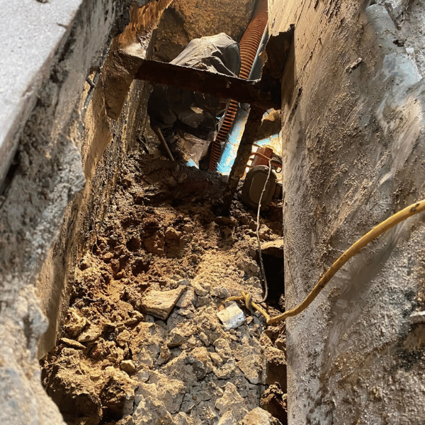 This image shows an example of large subsurface voids under a concrete slab in a commercial business, that needs to be filled. 