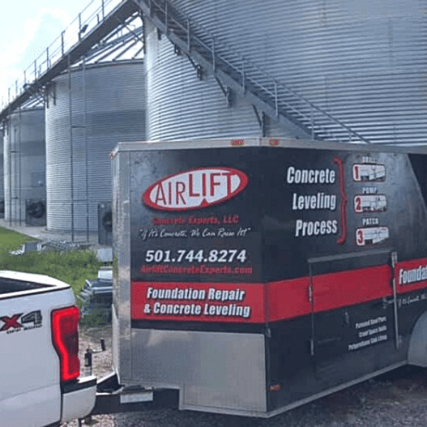 Look for signs a grain bin is sinking, and Airlift Concrete Experts can help-image shows Airlift on site at grain bin project.